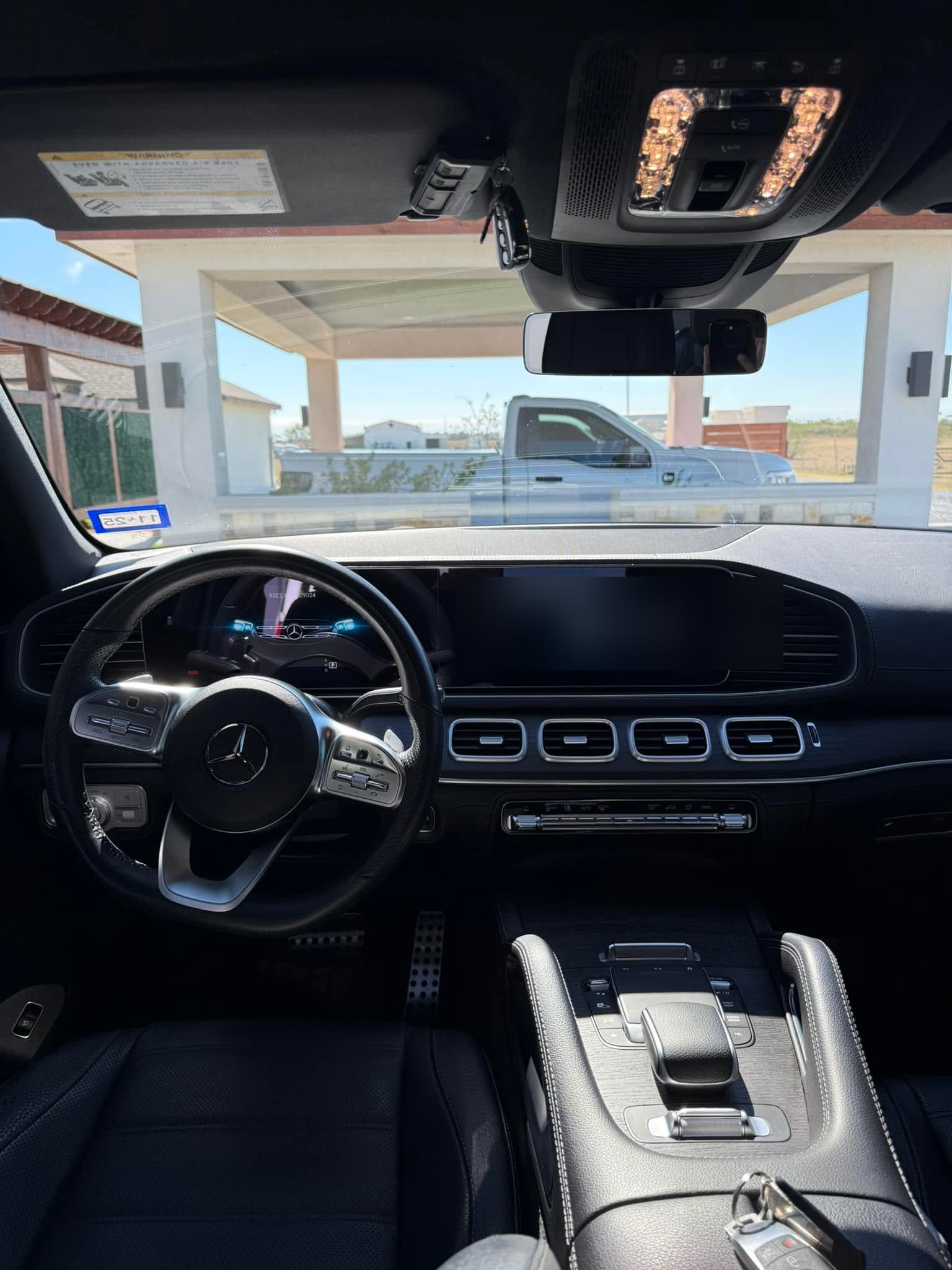 Freshly detailed black-leather interior and dashboard of a luxury SUV by I Auto Detailing in Pharr, TX