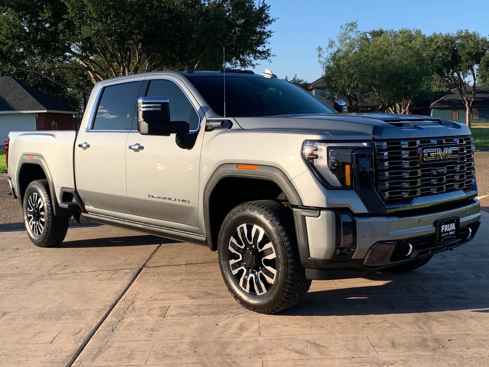Overhead view of a freshly washed GMC Denali HD truck gleaming on a driveway after an exterior detail by I Auto Detailing in McAllen, TX