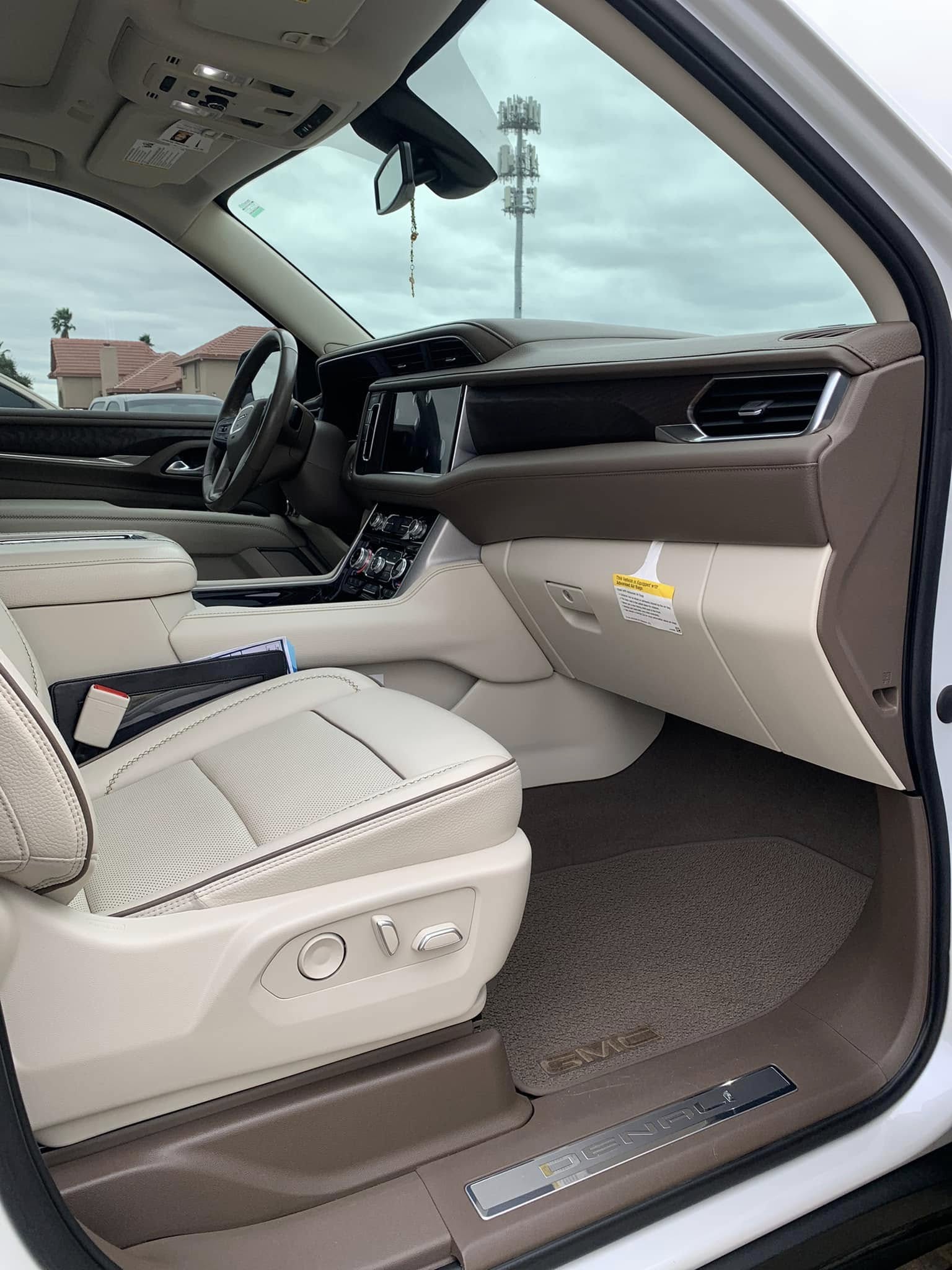 Luxury SUV interior detailing with clean leather seats and dashboard by I Auto Detailing in McAllen